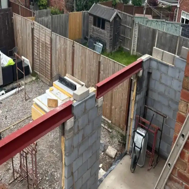 Engineer inspecting and designing retaining walls and structural repair solutions.