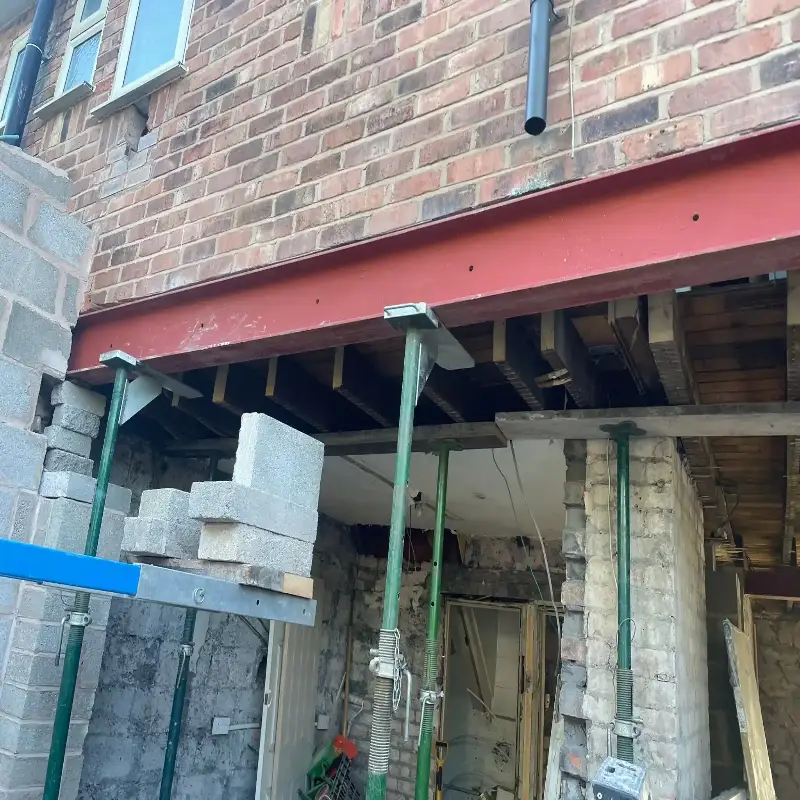 Loft conversion structural design showing new floor beams and roof support framework.